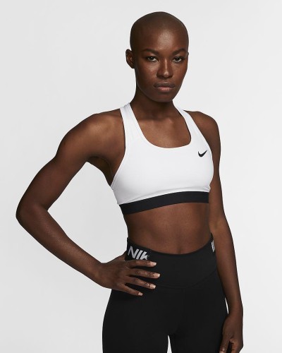 TOP NIKE WOMENS MEDIUM SUPPORT SPORTS CUERPO/FORRO: 82% POLIÉSTER RECICLADO 18% SPANDEX DOBLADILLO INFERIOR: 86% NYLON 14% SPAND